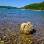 Beaver Lake shoreline with large rock
