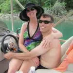 Couple enjoying Beaver lake boating