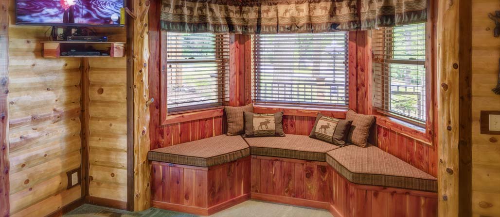 Homestead Cabin seating area by window